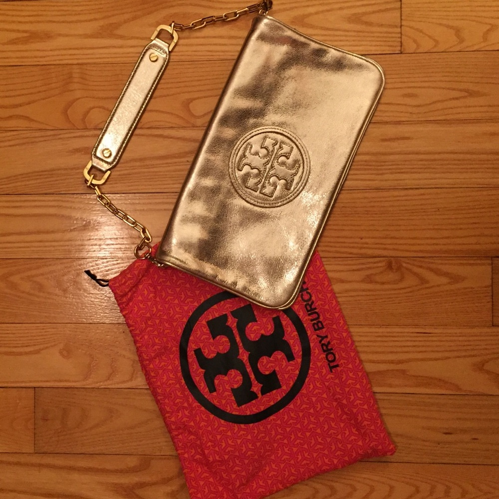 Tory Burch gold reva clutch with dustbag